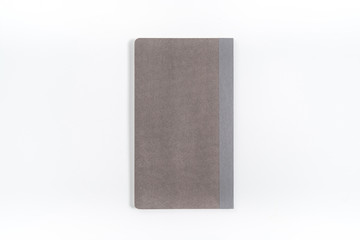 gray notebook isolated on white background.top view