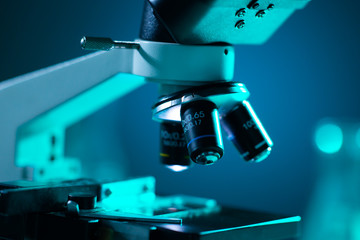 Close-up of scientific microscope. Laboratory in hospital. Epidemic disease, healthcare, vaccine...
