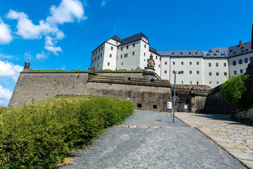 Fototapeta na wymiar The walls of castle Koenigstein in the Saxon Switzerland