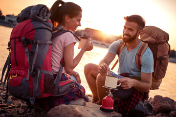 Mountaineers take break, to make tea.