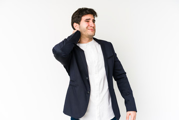 Fototapeta premium Young business man isolated on white background suffering neck pain due to sedentary lifestyle.