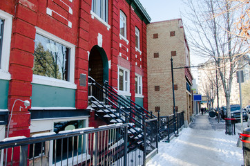 Traditional Red Bricked Store Building with Fence