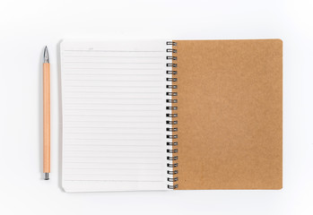 Brown spiral notebook isolated on white background.top view