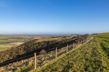 Naklejka premium A view over the South Downs in Sussex on a sunny day