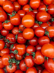 lots of ripe delicious red tomatoes for eating like a background