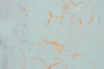 old shabby wall in yellow-blue shades