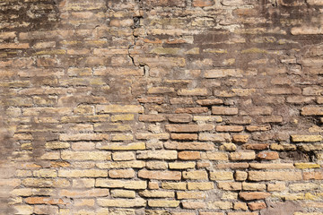 background of an antique wall made of red bricks