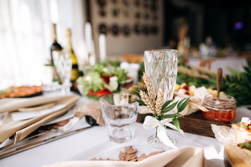 Beautiful wedding table decoration and decor in boho or rustic style