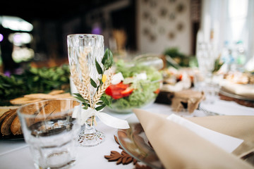 Beautiful wedding table decoration and decor in boho or rustic style