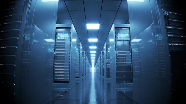 Countless modern server cabinets in a render farm. Dark, futuristic room. 4KHD