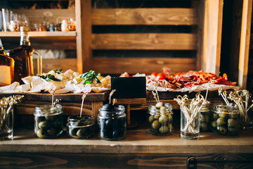 Wedding meat and cheese bar with cheese and tomatoes