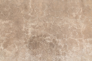 grainy cement wall background with cracks