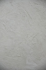 Fototapeta na wymiar White paint texture with a pattern. Texture wallpaper.