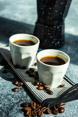 Cup of coffee on stone background