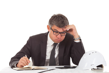 Gray haired businessman worries