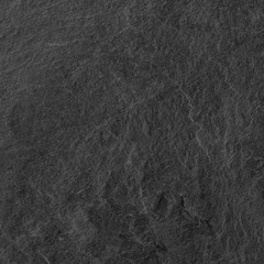Dark grey black slate background or texture.