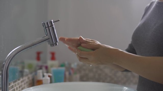 hands of woman wash your hands to prevent corona virus