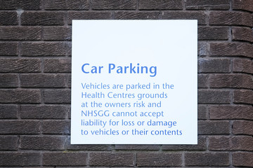Car park sign unable to accept responsibility or liability for thief, loss or damage