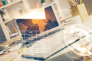 Forex market chart hologram and personal computer background. Double exposure. Concept of investment.