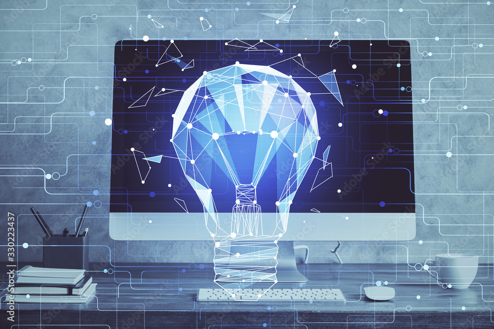 Poster computer on desktop in office with bulb icon hologram. multi exposure. concept of idea.