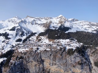 aerial drone panorma of swiss winter landscpae/village /lauterbrunnen 
