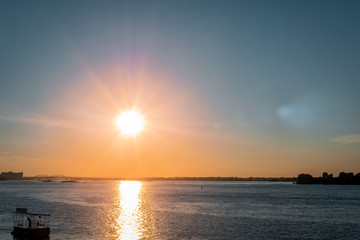 Fototapeta premium View of the river at sunset. Warm summer evening