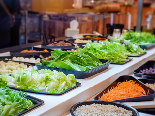 Assorted salad vegetables Placed on the counter In the supermarket