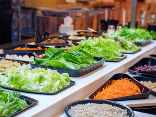 Assorted salad vegetables Placed on the counter In the supermarket