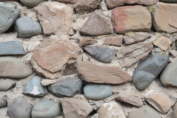 natural texture background of an old wall. old medieval masonry