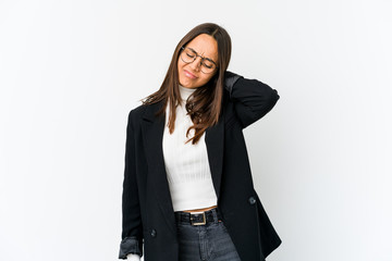 Young mixed race business woman isolated on white background suffering neck pain due to sedentary lifestyle.