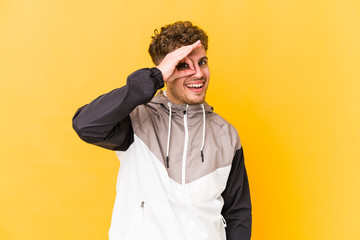  excited keeping ok gesture on eye.