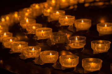 Lit Candles in Church Cathedral 
