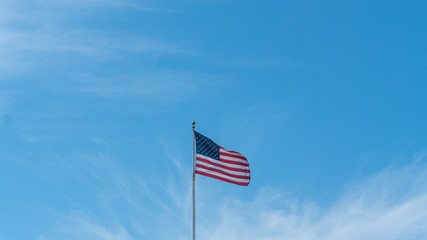 Old Glory under the blue sky of San Francisco
