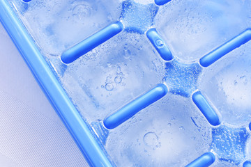 Ice in a Blue Ice Cube Tray