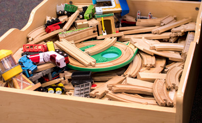 Fototapeta na wymiar Toy train tracks on a child's train table for creative play