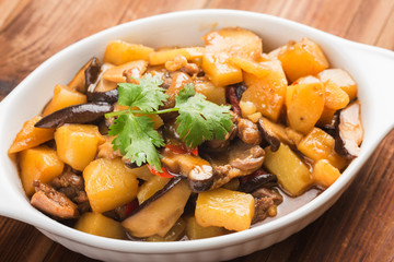 Stewed chicken with potato and mushroom
