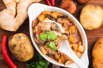 Stewed chicken with potato and mushroom