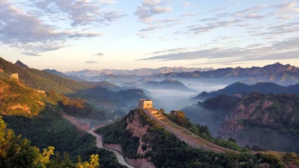 Acrylic prints Chinese wall Great Wall, fog, and mountains at sunset in China