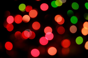 Abstract bokeh of light spots with black background