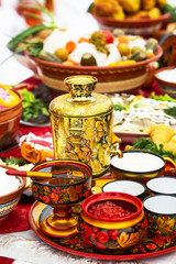 Festive Shrovetide table with food. Western Siberia, Russia