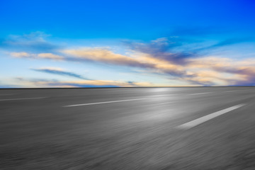 Fototapeta na wymiar Empty Highway Asphalt Road and Beautiful Sky Landscape