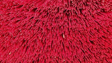 Many red Chinese wax candle sticks top view , abstract back ground
