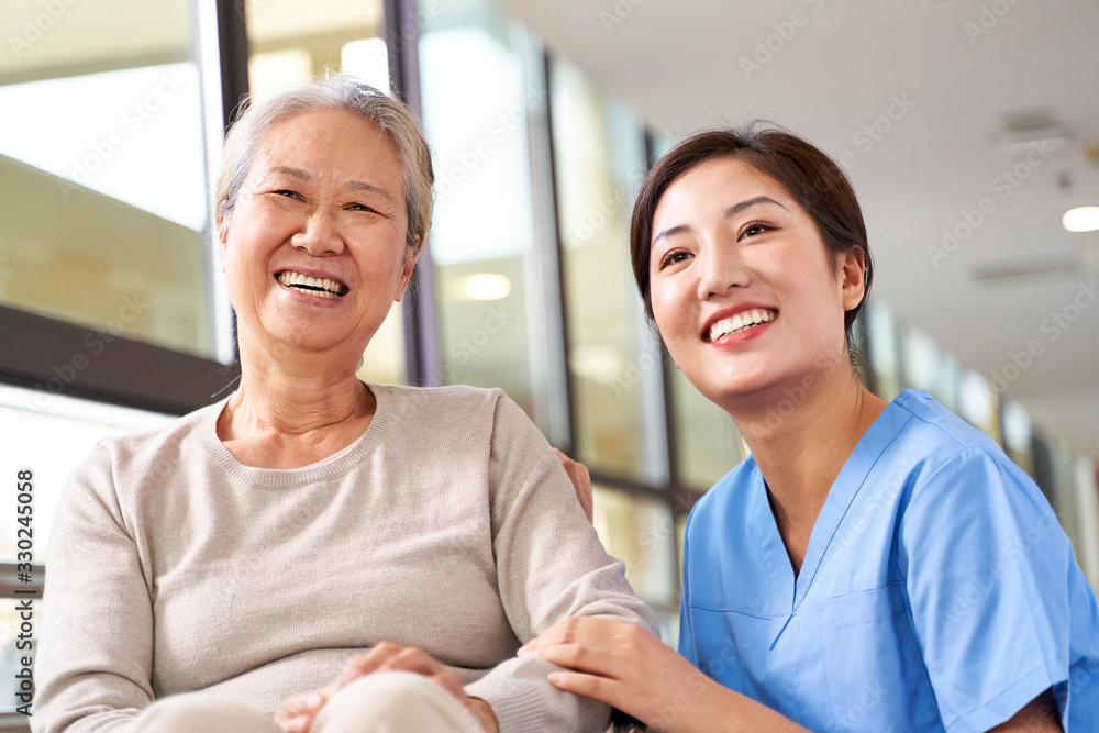 Sticker portrait of happy nursing home resident and caregiver