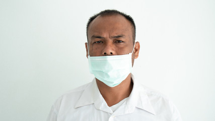 Young man sick and wearing mask on face