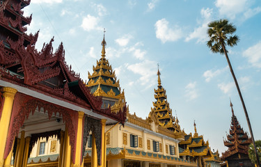 Fototapeta premium Shwedagon Pagoda golden intricate temples.