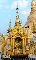 Golden Buddha statue at Shwedagon Pagoda, Yangon, Myanmar.