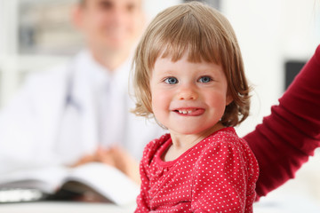 Little child with mother at pediatrician reception. Physical exam, cute infant portrait, baby aid, healthy lifestyle, ward round, child sickness, clinic test, high quality and trust concept