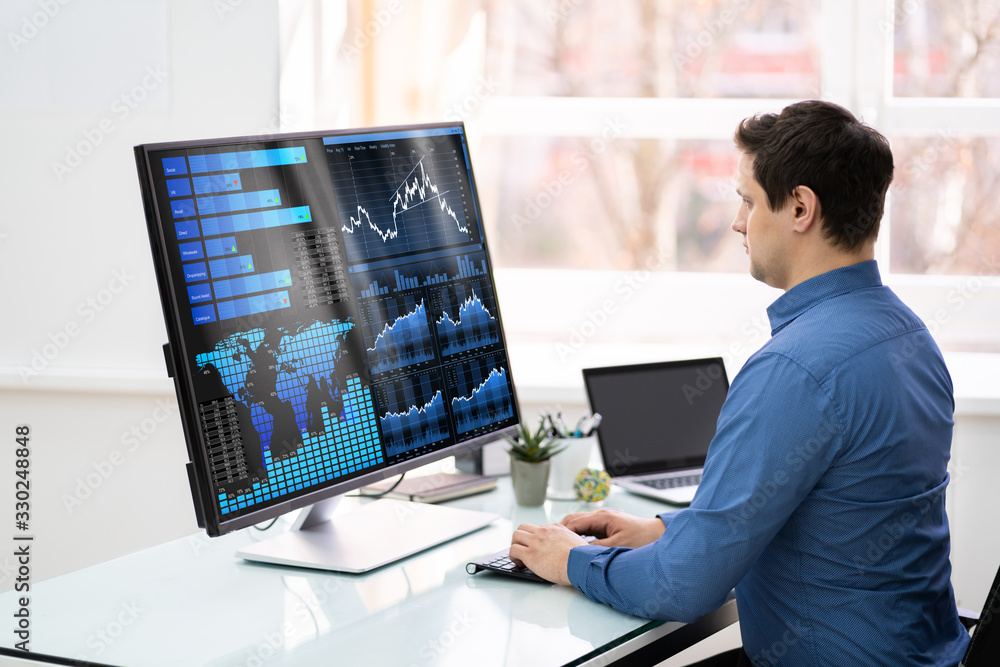 Poster Businessman Analyzing Graphs On Computer