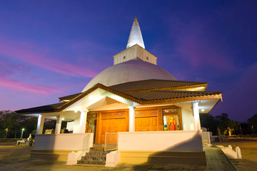 Old Buddhist temple at Mirisawetiya Dagoba in the evening twilight. Anuradhapura, Sri Lanka