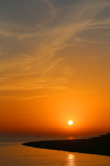 Fototapeta na wymiar Photo beautiful sunset on the sea coast